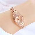 Montre bracelet élégante pour femme en or rose avec strass brillants et cadran ovale - Boîtier Or Rose Cadran Or Rose
