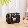 Black jelly crossbody bag with quilted diamond pattern and white pearl handle - Black