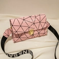 Pink crossbody bag featuring geometric triangle patterns and a lettered shoulder strap - Pink