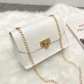 Elegant pearl white mini chain crossbody bag with golden hardware on white fur rug - White