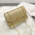 Elegant gold mini chain shoulder bag with a square metal lock in a minimalist style - Green