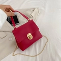 Mini magenta handbag with crocodile texture and gold chain strap in stylish magenta finish - Red