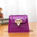 Mini purple jelly crossbody bag with stylish gold studs and elegant chain strap - Purple