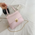 Light pink faux crocodile leather mini bag with gold twist lock and chain strap - Pink