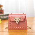 Pink mini jelly shoulder bag with square studs and golden metal lock detail - Pink