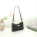 Chic black underarm bag with small grid texture and gold-toned metal plate - Black