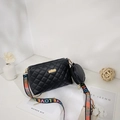 Quilted black crossbody bag with round coin purse and colorful embroidered guitar strap - Black