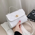 Elegant white quilted crossbody bag with gold-tone twist lock and top handle for women - White