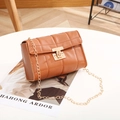 Brown quilted crossbody bag with gold chain strap and square turn-lock closure - Brown