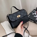 Classic black quilted crossbody bag with golden rotary lock and fine shoulder strap - Black