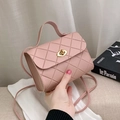 Pink quilted crossbody bag with gold rotary lock and compact faux leather handle - Pink