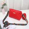 Red quilted crossbody bag with patterned love strap and matching coin purse - Red