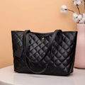 Large black quilted tote bag with dual shoulder straps and metallic hardware detail - Black