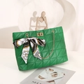Emerald green quilted handbag with gold chain handle and decorative vintage silk scarf - Green