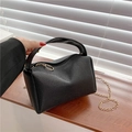 Chic black lychee grain leather pillow bag with elegant golden chain strap for women - Black