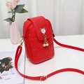 Red quilted crossbody bag with pearl cat ear charm and dual zipper compartments - Red