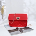 Elegant red quilted crossbody bag with golden heart clasp and chain strap - Red