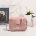 Pink minimalist faux leather crossbody bag with FASHION print and gold metal accents - Pink