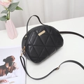 Elegant black semicircular crossbody bag with triangle quilting and gold metal hardware - Black