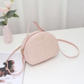 Pink quilted shell crossbody bag with golden hardware and matching top handle - Pink