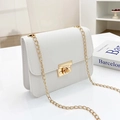 White PU leather crossbody chain bag with gold rectangular lock shown at a 45-degree angle - White