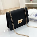 Classic black leather crossbody bag with gold chain strap and square metal buckle closure - Black