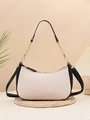 Chic beige and black litchi textured crescent bag with golden chain and branding - Off-white with Black