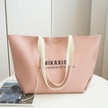 Roze grote tote bag met witte schouderbanden en MIKAXIO-opdruk aan de voorzijde - Roze