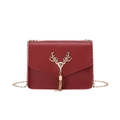 Deep red crossbody square bag with gold deer head emblem and metal tassel chain strap - Red