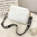 White V-quilted camera bag with a wide LOVE printed crossbody strap on white faux fur - White