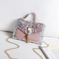 Pink transparent sequin mini bag with pearl cat detail and golden fringe chain - Pink