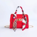 Red candy color handbag with gold chain strap and silk scarf wrapped handle detail - Red
