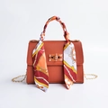 Brown orange leather handbag with gold twist lock and decorative silk scarf handle - Dark Brown