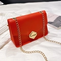 Chic mini red chain crossbody bag with golden hardware and lychee grain texture - Red