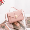 Pink faux leather mini bag with crocodile texture and elegant pearl buckle detail - Pink
