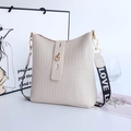 Creamy white crocodile embossed bucket bag with wide LOVE strap and gold buckle - White