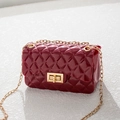 Quilted jelly crossbody bag in dark red finish with golden chain strap and metal lock - Red