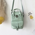 Piccolo zaino e borsa a tracolla in pelle PU verde menta con logo TB e cinghie - Verde