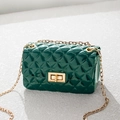 Dark green quilted jelly shoulder bag with gold chain and turn-lock closure - Green