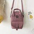 Mini faux leather backpack in dusty rose featuring a metallic TB logo and top handle - Rose Red