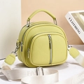 Litchi pattern leather crossbody bag in lime green with double zippers and wide logo strap - Green