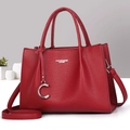 Close-up of red lychee pattern leather tote bag with silver logo and metal C-pendant - 29*10*21CM / Burgundy