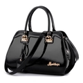 Fashionable black patent leather handbag with gold hardware and detachable strap for women - Black