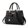 Elegante schwarze PU-Leder Handtasche für Damen mit Schleifenanhänger und Gurt - Schwarz