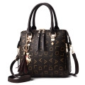 Dark brown tote bag with repeating letter prints, dual handles, and a tassel charm - Dark Coffee