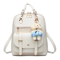 White faux leather backpack with gold metal zippers and cute teddy bear pendant - White