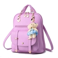 Chic purple PU leather backpack for women with cute bear charm and golden hardware detail - Purple