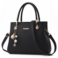 Classic black lychee pattern leather handbag for women with elegant golden hardware - Black