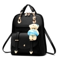 Women's black faux leather backpack with gold zippers and blue dressed bear charm - Black