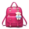 Vibrant rose red PU leather backpack for women featuring a cute plush bear charm accessory - Rose Red